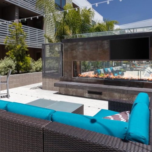 Relax and unwind poolside a pool in a backyard