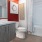 a bathroom with a tub toilet and sink