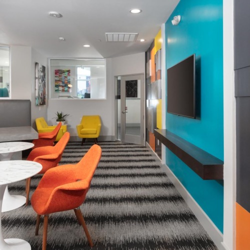 Enjoy our resident-only features a room with a couch and a table