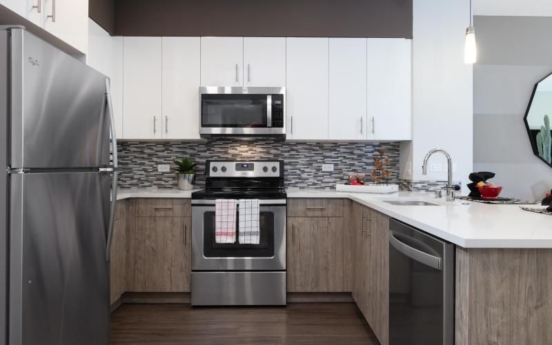 a kitchen with white cabinets