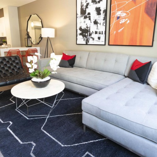 Find your perfect fit at Vaya a living room with a couch and a coffee table