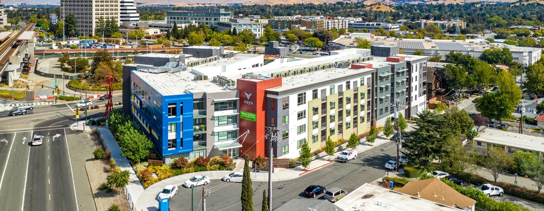 Aerial view of the buildings and community surrounding Vaya apartments for rent in the San Francisco Bay area