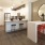 a kitchen with a table and chairs